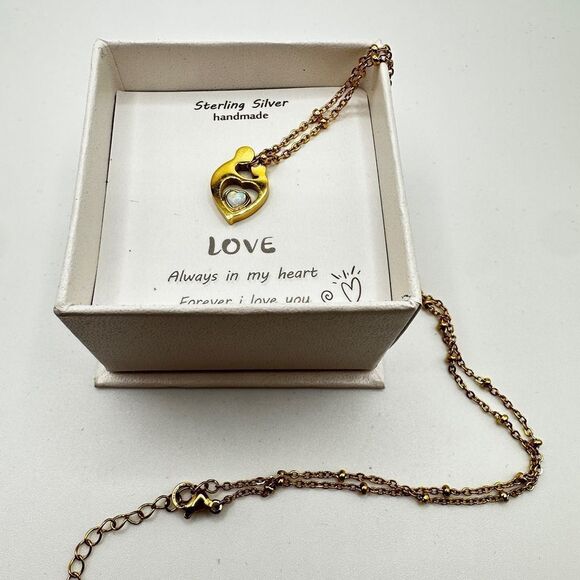 NIB gold tone "mother and child" holding opal, 18" necklace! - Picture 11 of 13